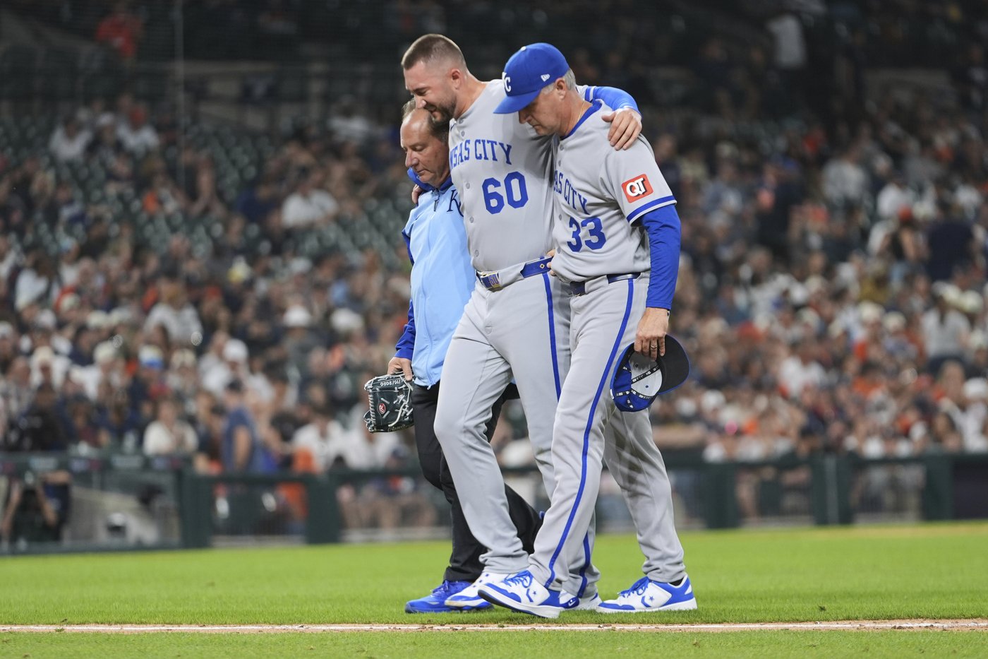 Royals pitcher Lucas Erceg helped off field after hard grounder hits left foot | iNFOnews.ca