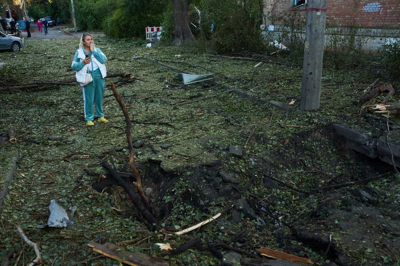 Photos show Kyiv residents clutching pets, collecting bodies after Russian missile and drone attack | iNFOnews.ca
