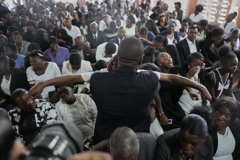 Hundreds attend funeral in Haiti for 4 victims of brutal gang attack that killed 47 | iNFOnews.ca