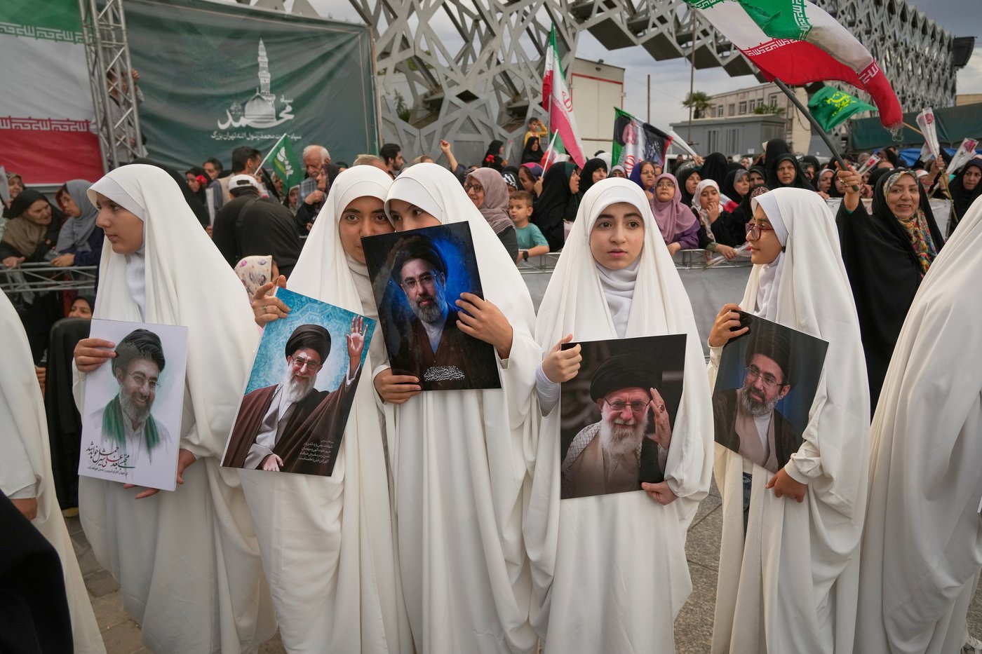 Photos of a mass wedding and a colorful missile at Tehran's 'Sacrifice for Iran' ceremony | iNFOnews.ca