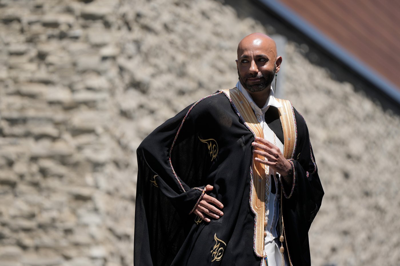 In a rainbow-trimmed robe at the World Cup, a gay Qatari doctor advocates for equal rights | iNFOnews.ca