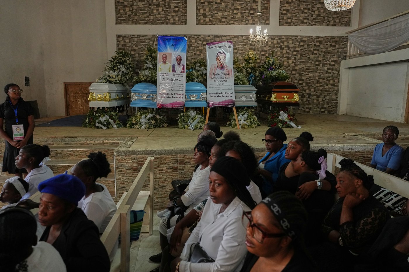 Mourners file into a church in Haiti where gangs killed dozens of people in latest rampage | iNFOnews.ca
