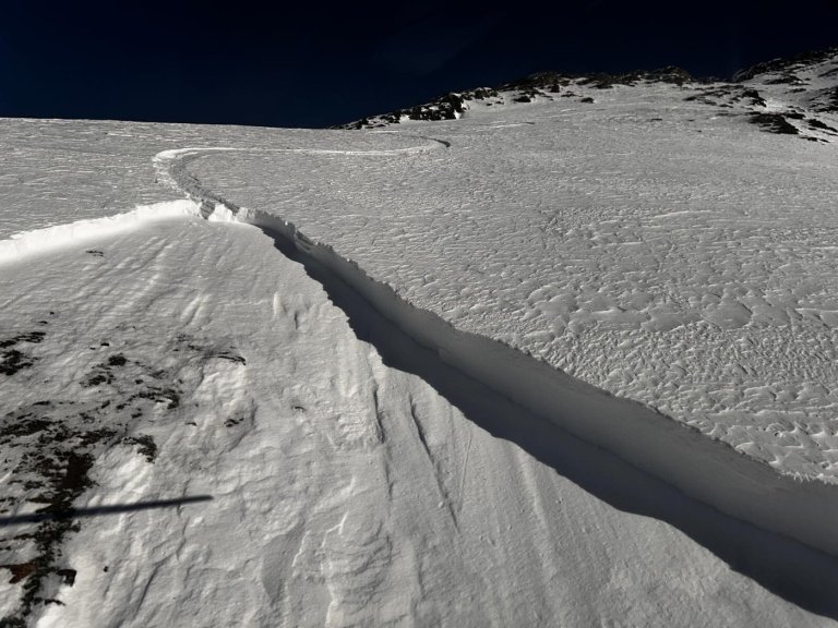 Skier buried up to waist after triggering backcountry avalanche in Alberta Rockies | iNFOnews.ca