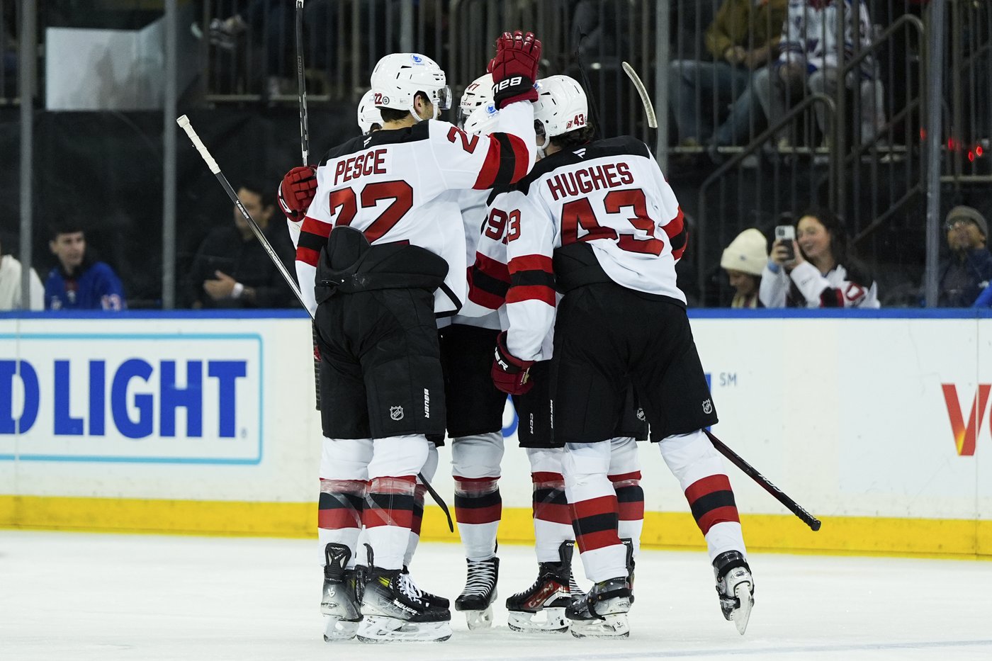 Jesper Bratt has goal and 3 assists, Jack Hughes scores 2 as Devils beat reeling Rangers 5-1 | iNFOnews.ca
