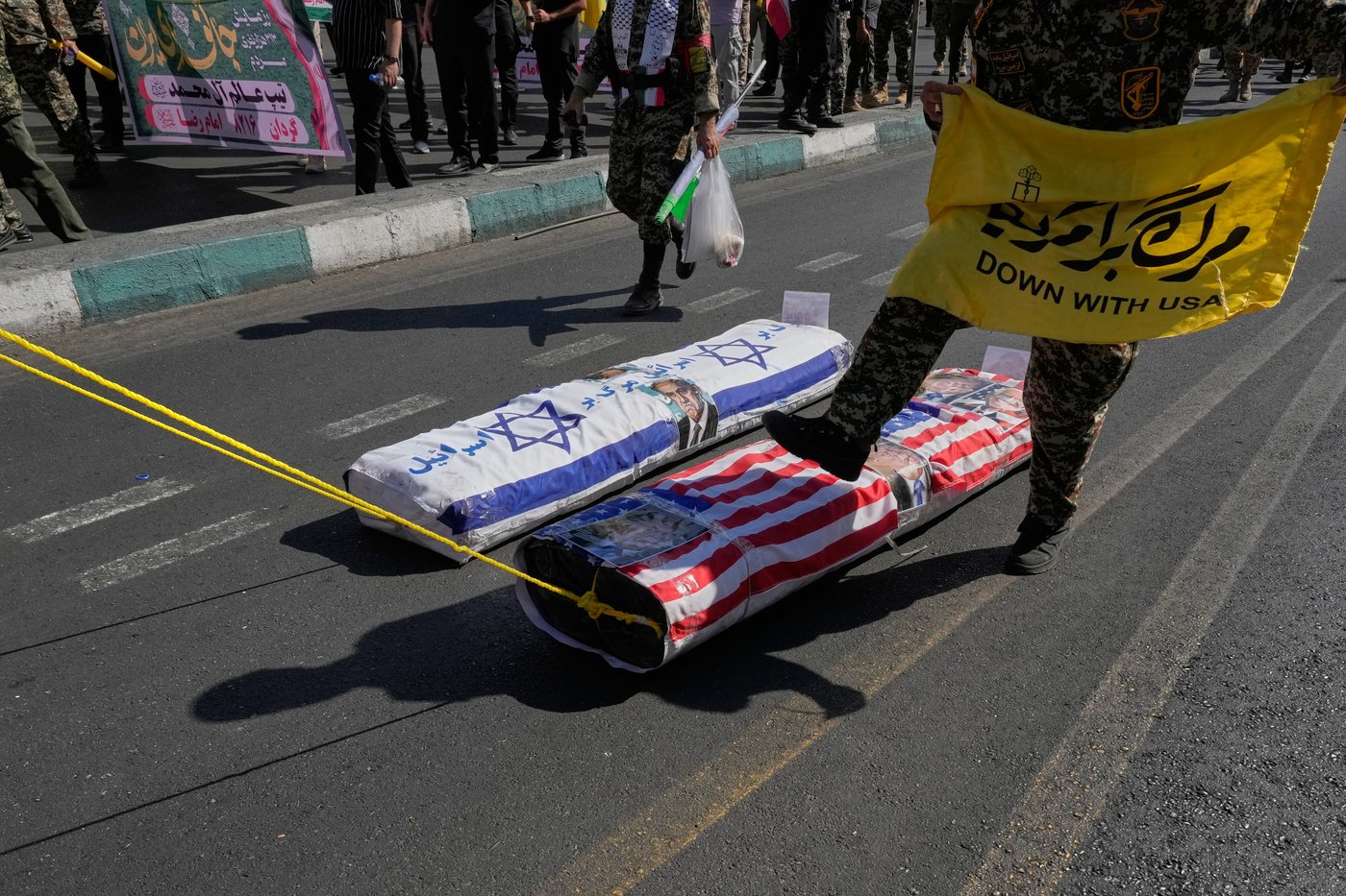 Iran stages massive Tehran rally as volunteers pledge to take up arms, in photos | iNFOnews.ca