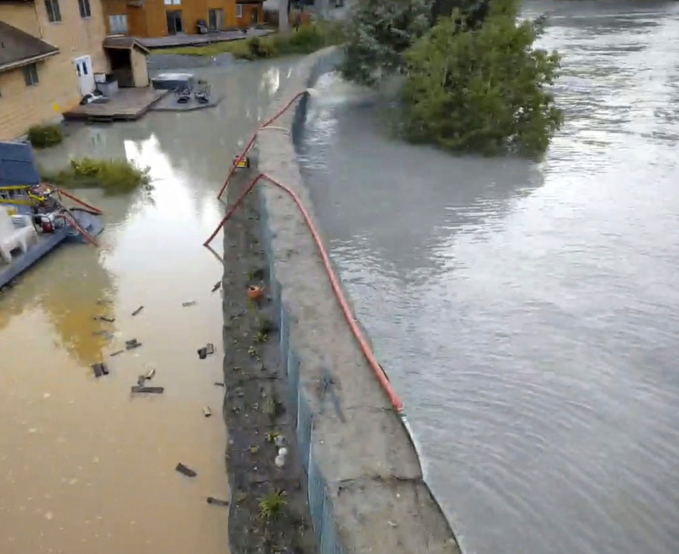 Temporary barriers spared Alaska's capital from severe flooding. A long-term solution is elusive | iNFOnews.ca Temporary barriers spared Alaska's capital from severe flooding. A long-term solution is elusive | iNFOnews.ca