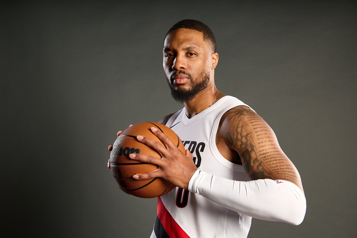 Not currently playing and not a coach, Damian Lillard has a unique role with the Blazers | iNFOnews.ca