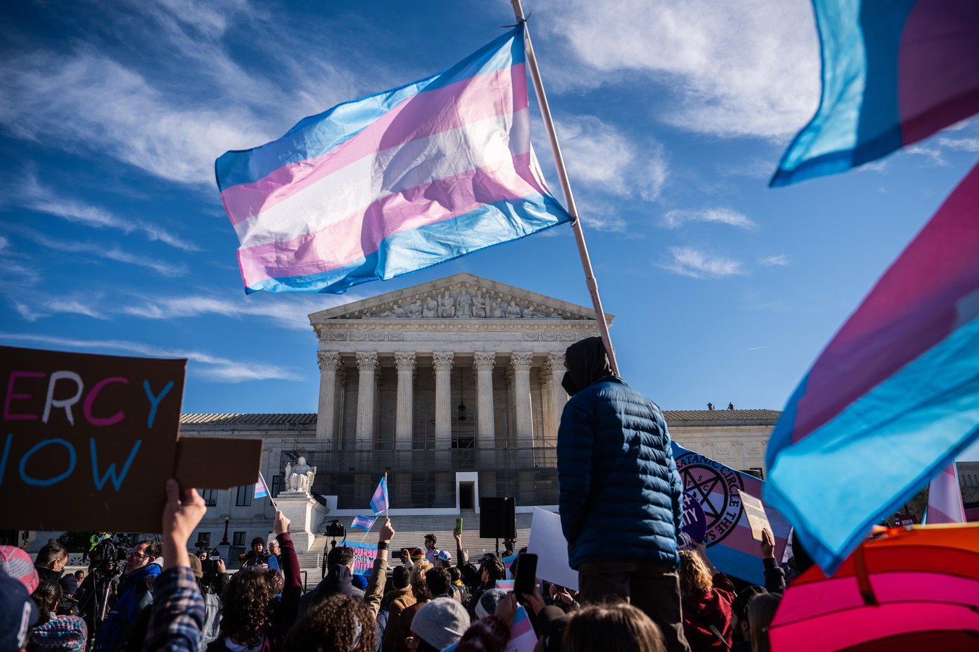 Photos of demonstrators outside the Supreme Court as it considers upholding transgender sports bans | iNFOnews.ca