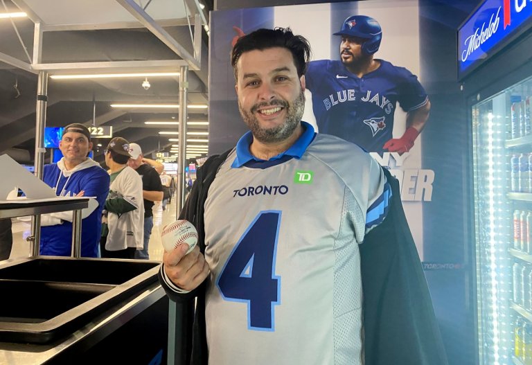 'Most real I've ever felt': Fan who caught Springer's home run ball savours moment | iNFOnews.ca