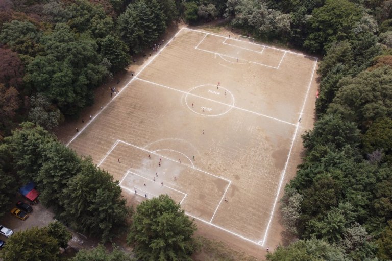 A football league plays in an extinct volcano crater, fiercely guarding its 'Field of the Gods' | iNFOnews.ca