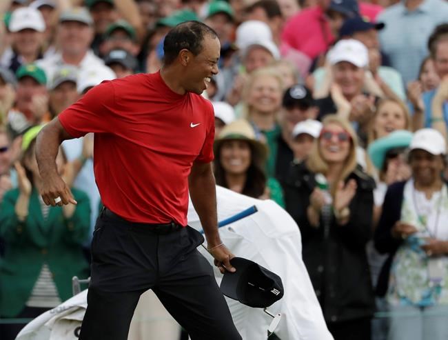 Tiger Woods' red mock turtleneck popular with golf fans following Masters win | iNFOnews.ca