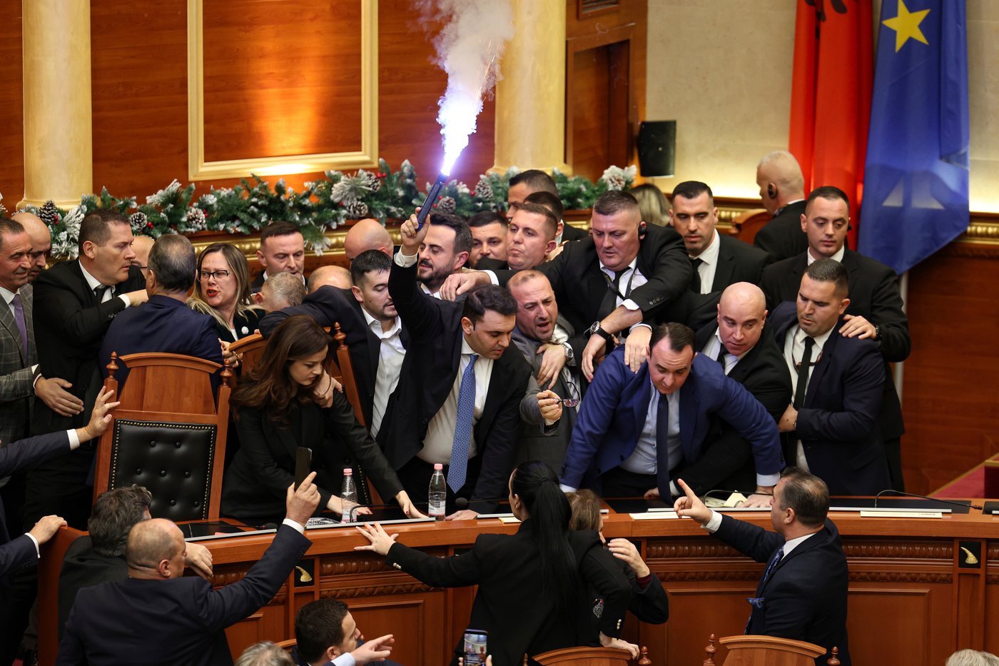 Albanian lawmakers scuffle, set off flares during parliament session | iNFOnews.ca