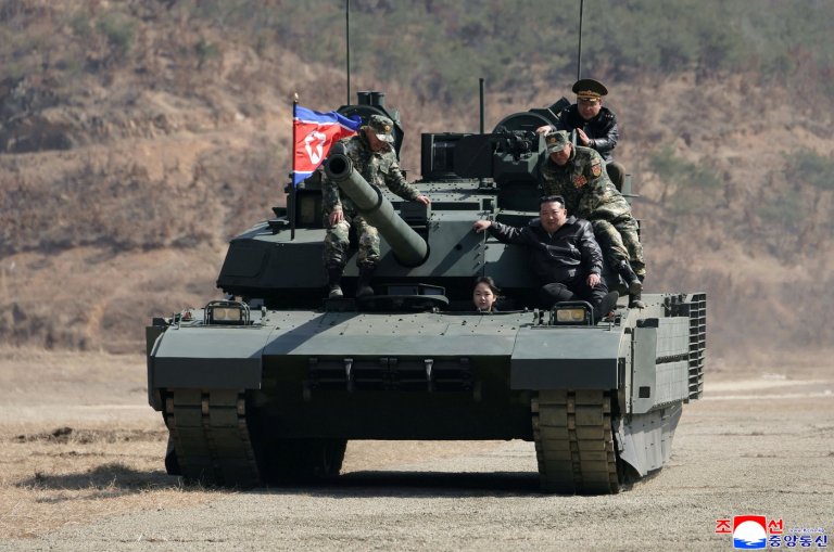 North Korean leader Kim and his daughter ride a tank together during army training | iNFOnews.ca