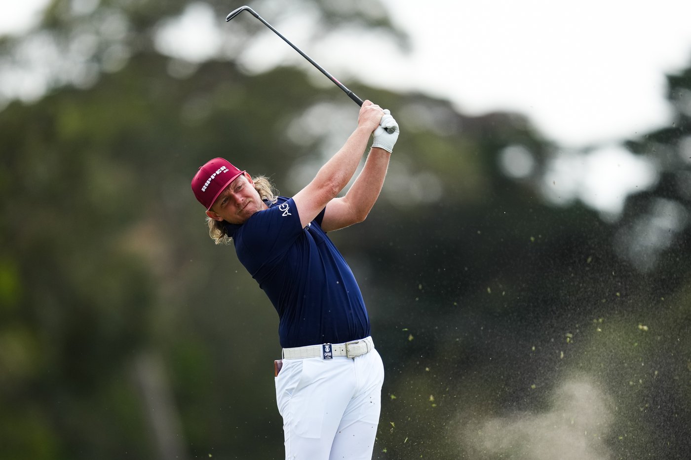 Rory McIlroy's late birdie burst means he'll be playing on the weekend at the Australian Open | iNFOnews.ca