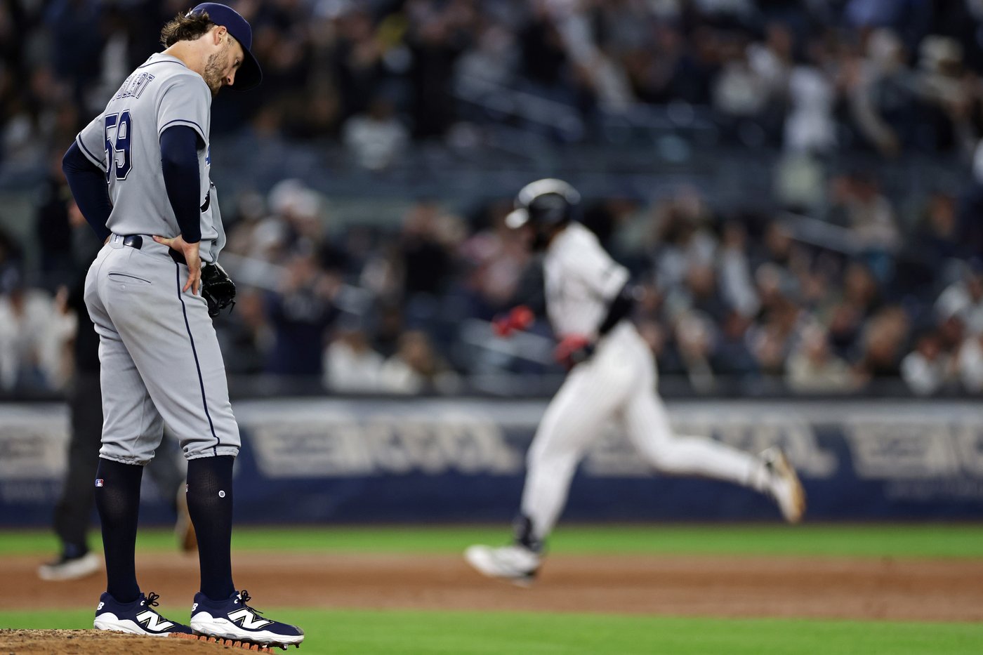 Lombard's incredible slide, tiebreaking homer lift Yanks over Rays. Schlitter finishes with 1.95 ERA | iNFOnews.ca
