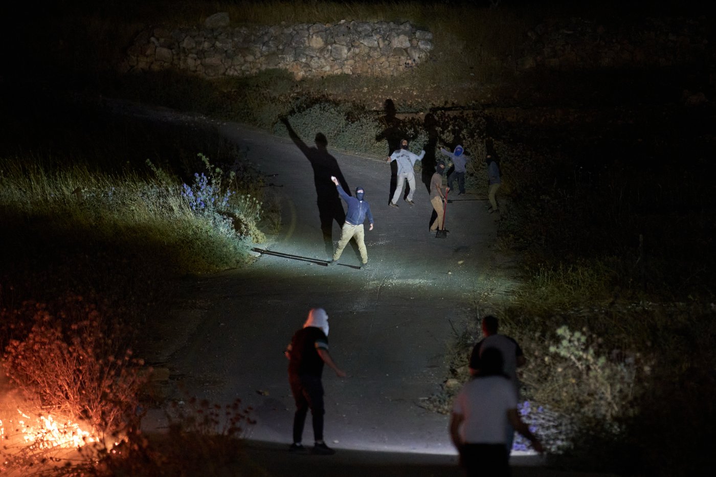Photos show West Bank Palestinians keeping watch at night as settler violence grows | iNFOnews.ca