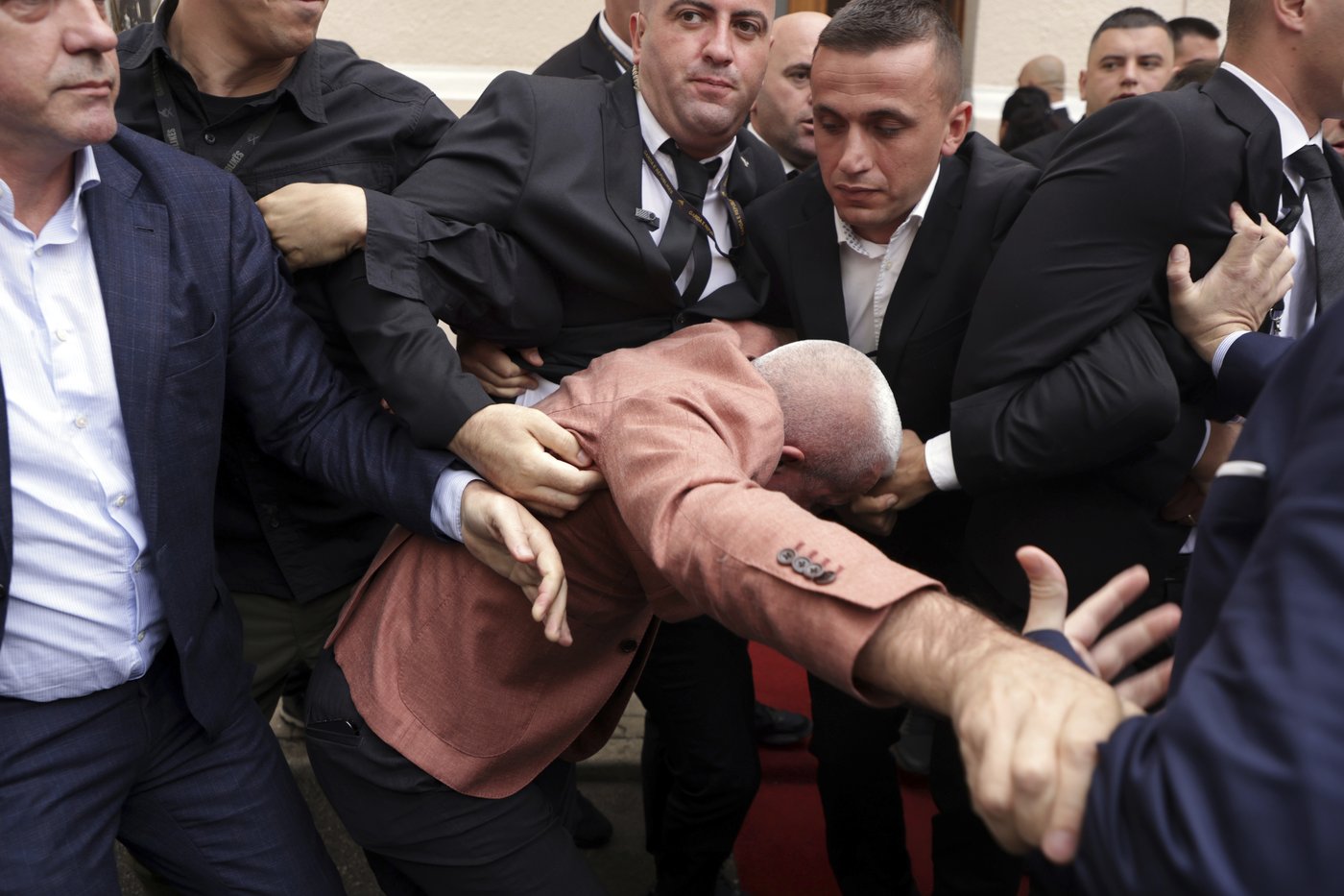 Albanian opposition MPs try to disrupt Parliament to protest a colleague's imprisonment | iNFOnews.ca