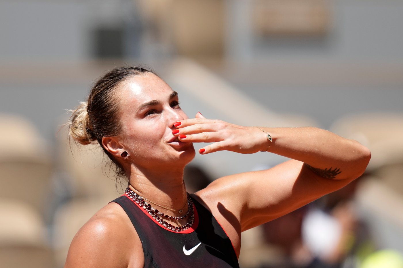 Sabalenka's necklaces sparkle in the sun during French Open win. Gauff, Osaka, Sinner advance | iNFOnews.ca Sabalenka's necklaces sparkle in the sun during French Open win. Gauff, Osaka, Sinner advance | iNFOnews.ca