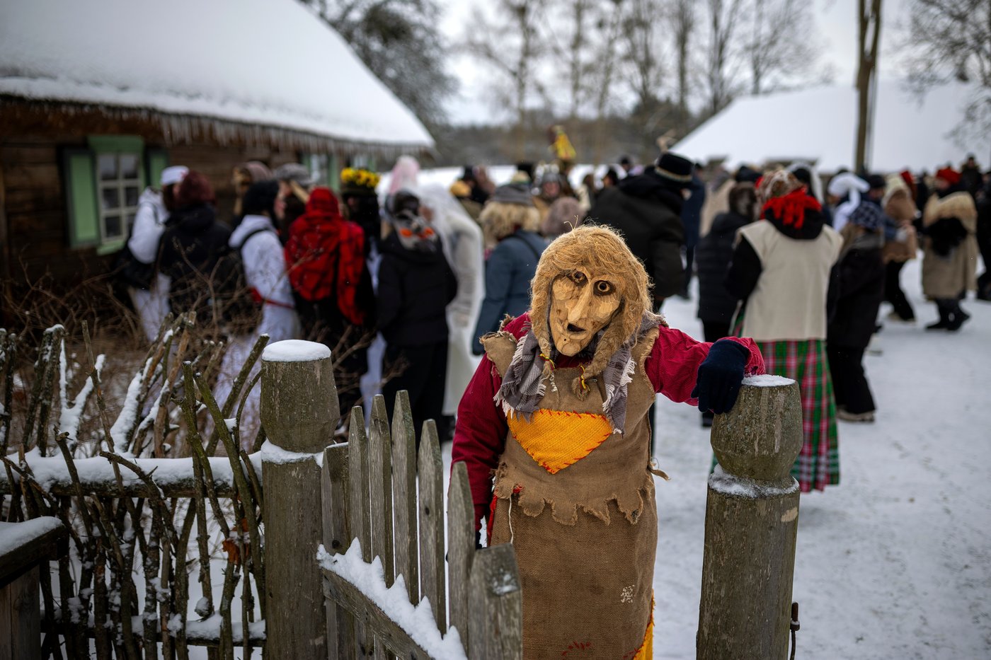 Photos show masked revelers celebrating Shrovetide in Lithuania | iNFOnews.ca