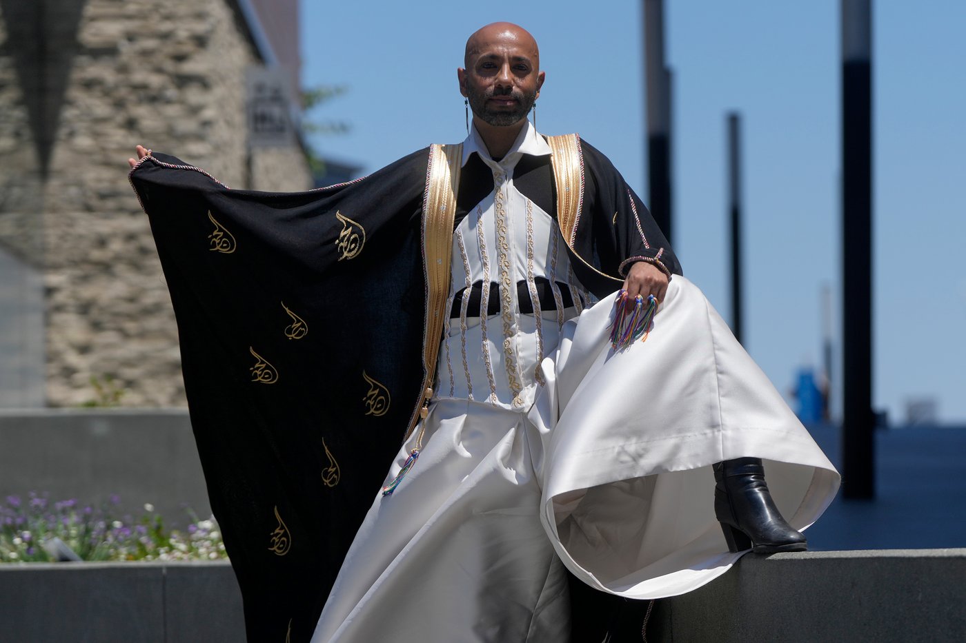 In a rainbow-trimmed robe at the World Cup, a gay Qatari doctor advocates for equal rights | iNFOnews.ca