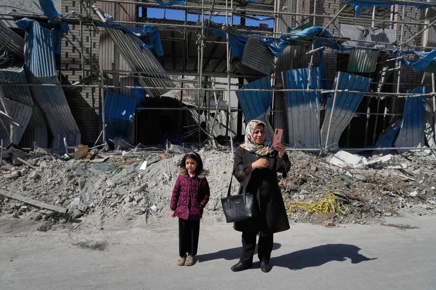 Photos show rubble and mourning in Iran's capital after US and Israeli airstrikes | iNFOnews.ca