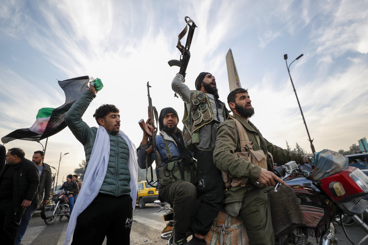 One week into a new Syria, rebels aim for normalcy and Syrians vow not to be silent again | iNFOnews.ca