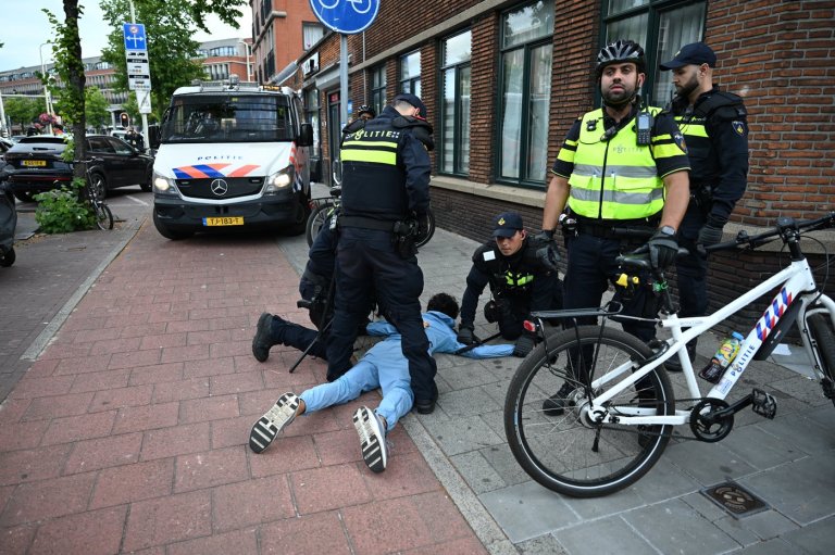Soccer fans clash with police in The Hague after Morocco stuns the Netherlands at the World Cup | iNFOnews.ca