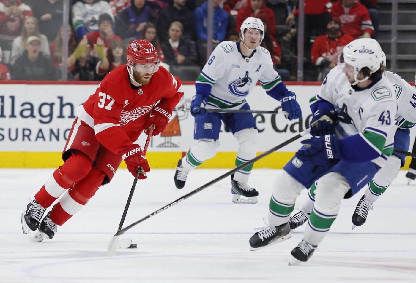Jake DeBrusk scores hat trick, including OT game-winner, as Canucks top Red Wings 5-4 | iNFOnews.ca