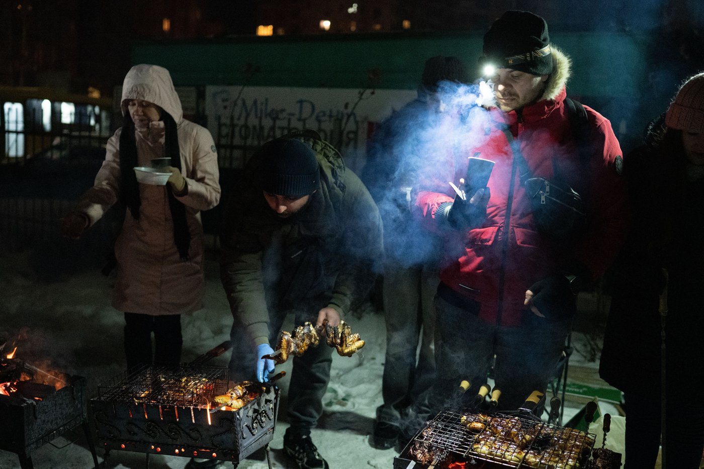 Photos show Ukrainians enduring a frigid winter after Russian strikes knocked out power | iNFOnews.ca