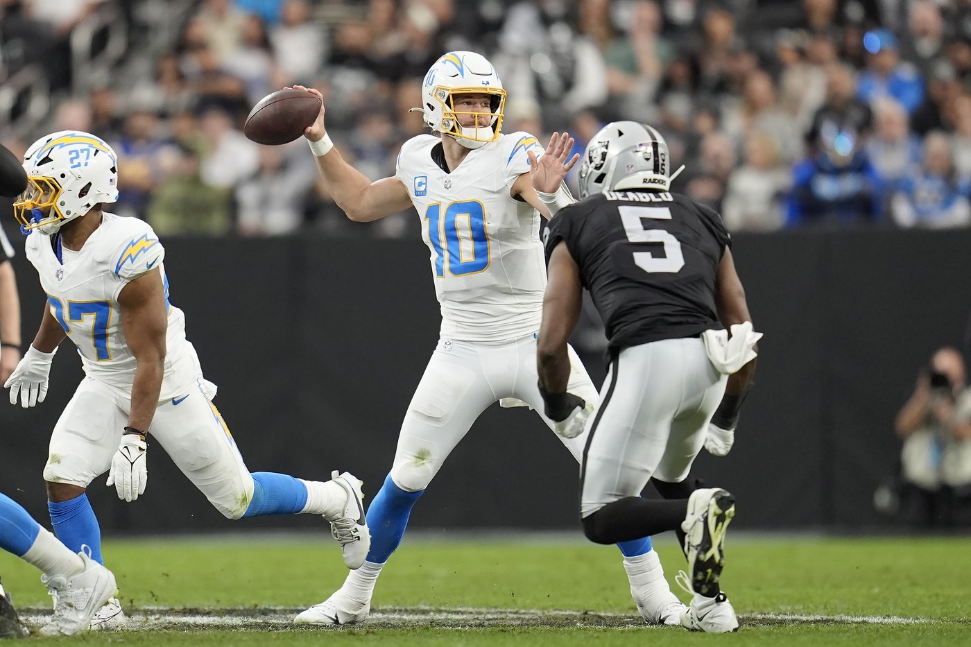 Harbaugh back in Houston for playoffs a year after winning college title when Chargers visit Texans | iNFOnews.ca Harbaugh back in Houston for playoffs a year after winning college title when Chargers visit Texans | iNFOnews.ca