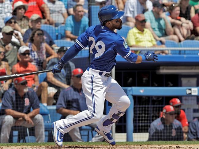Jays' Devon Travis says knee feels fine after spring debut | iNFOnews.ca CP897625419