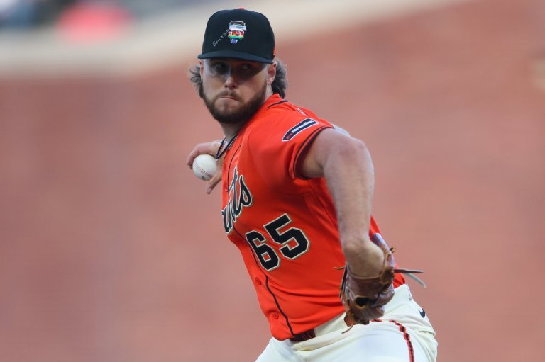MLB issues warning after Giants' Roupp, 2 other pitchers add Bible verses to their Pride Night caps | iNFOnews.ca