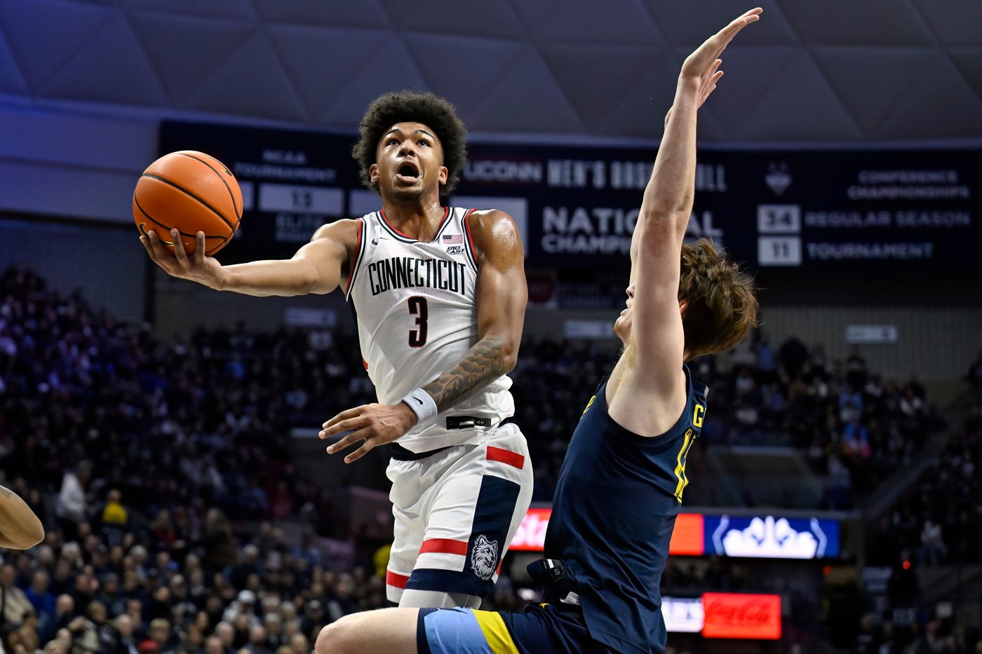 Ball, No. 4 UConn push winning streak to 10 games with 73-57 win over visiting Marquette | iNFOnews.ca