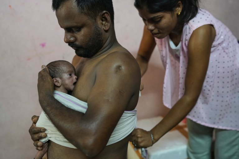 Photos show newborn caregiving programs helping ease parenting in India | iNFOnews.ca