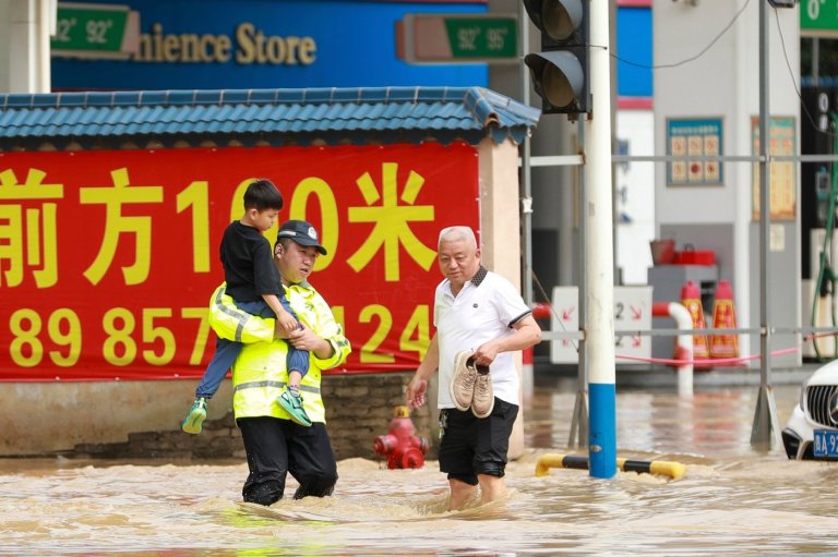 Torrential rain and floods batter China, killing at least 12 and forcing mass evacuations | iNFOnews.ca