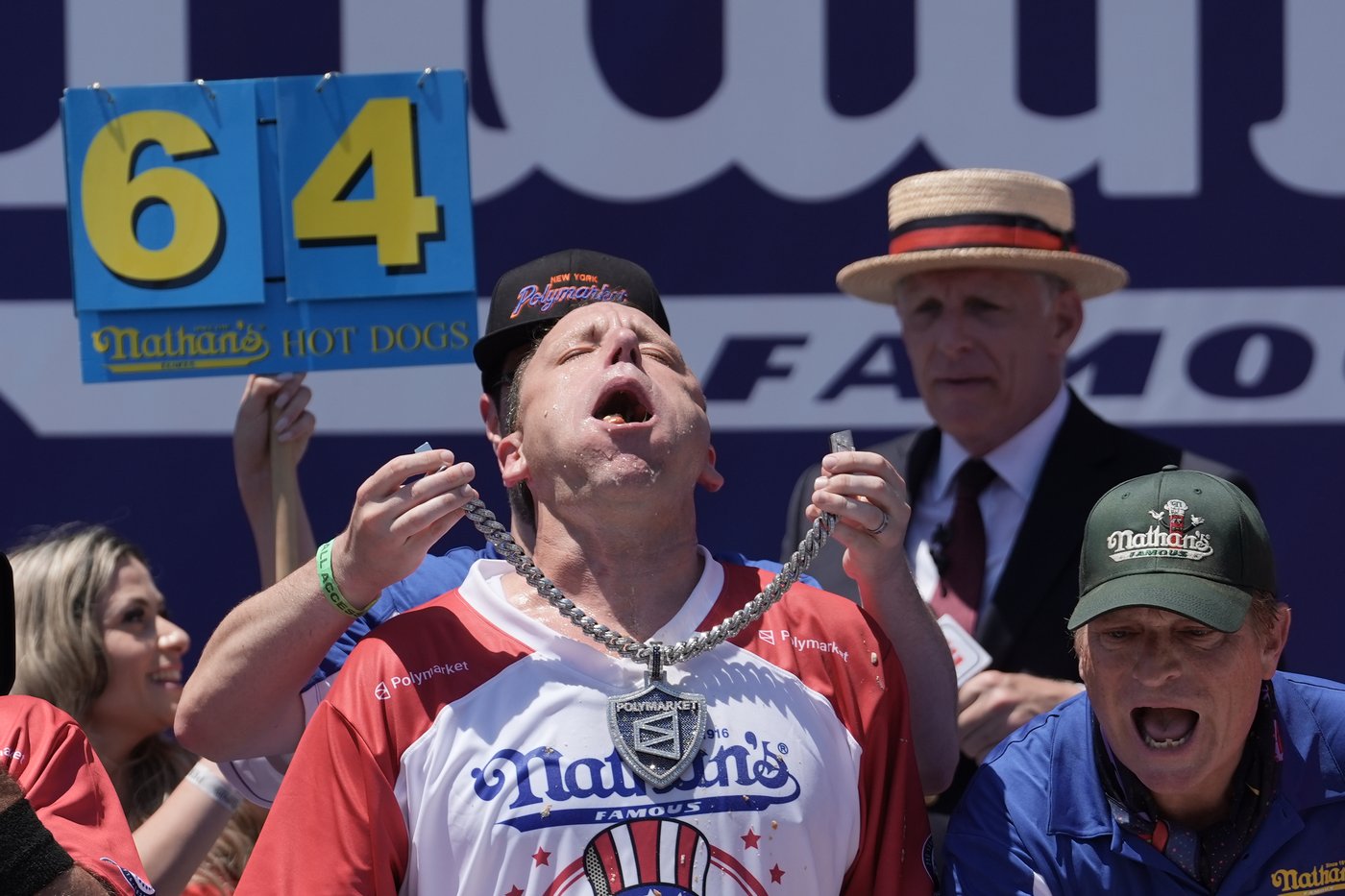 Joey Chestnut eats 66 hot dogs to again claim Mustard Belt at Nathan's Famous contest | iNFOnews.ca