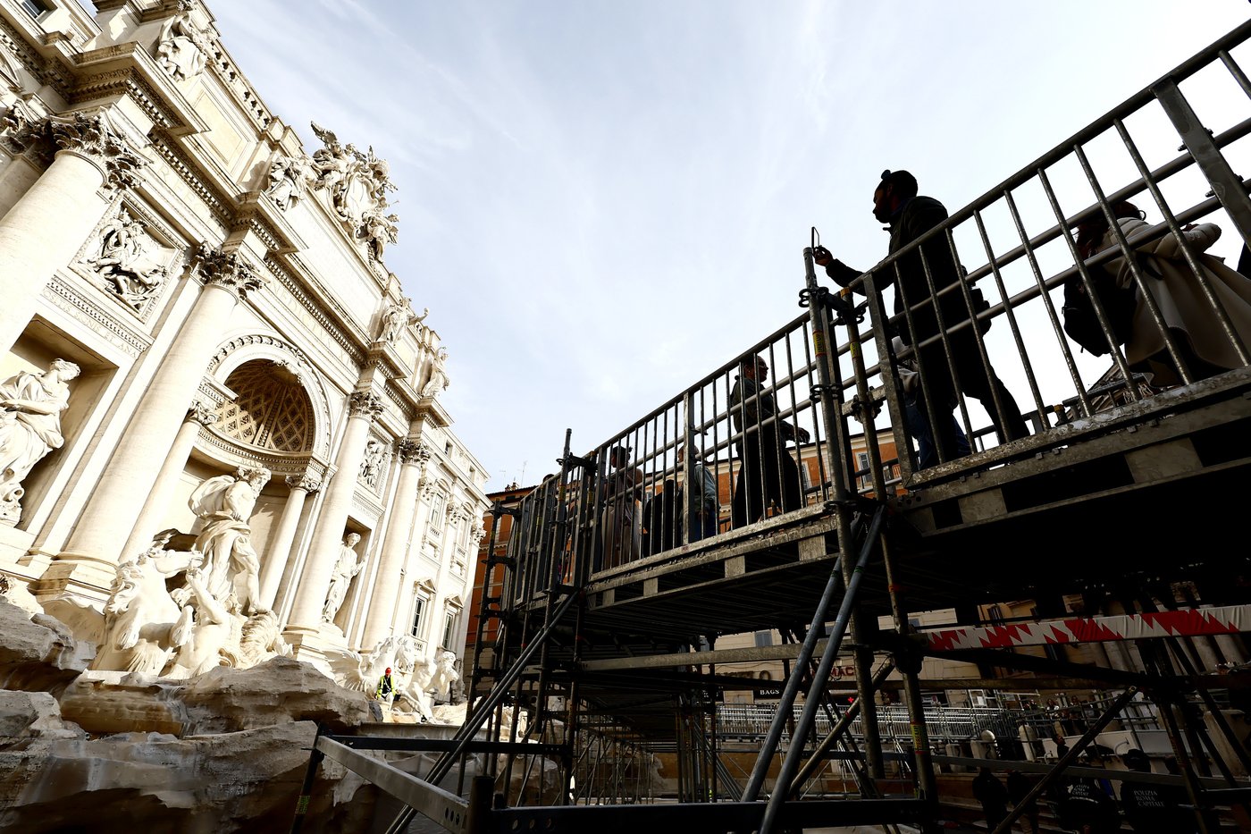 Tourists in Rome now have a walkway to visit the Trevi Fountain but can't toss coins | iNFOnews.ca