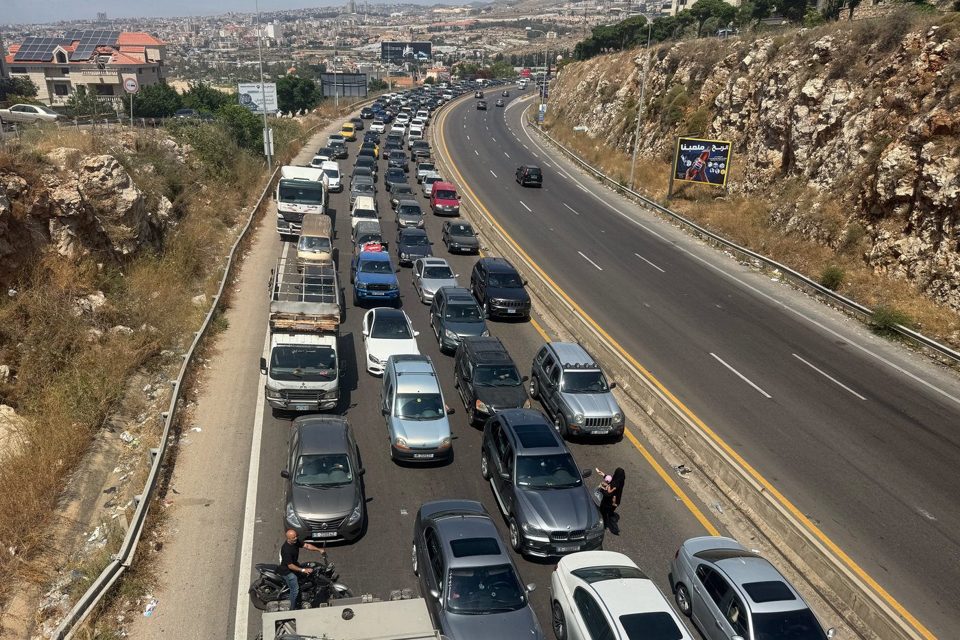 Lebanese return home to destruction after word of an initial US-Iran deal, in photos | iNFOnews.ca