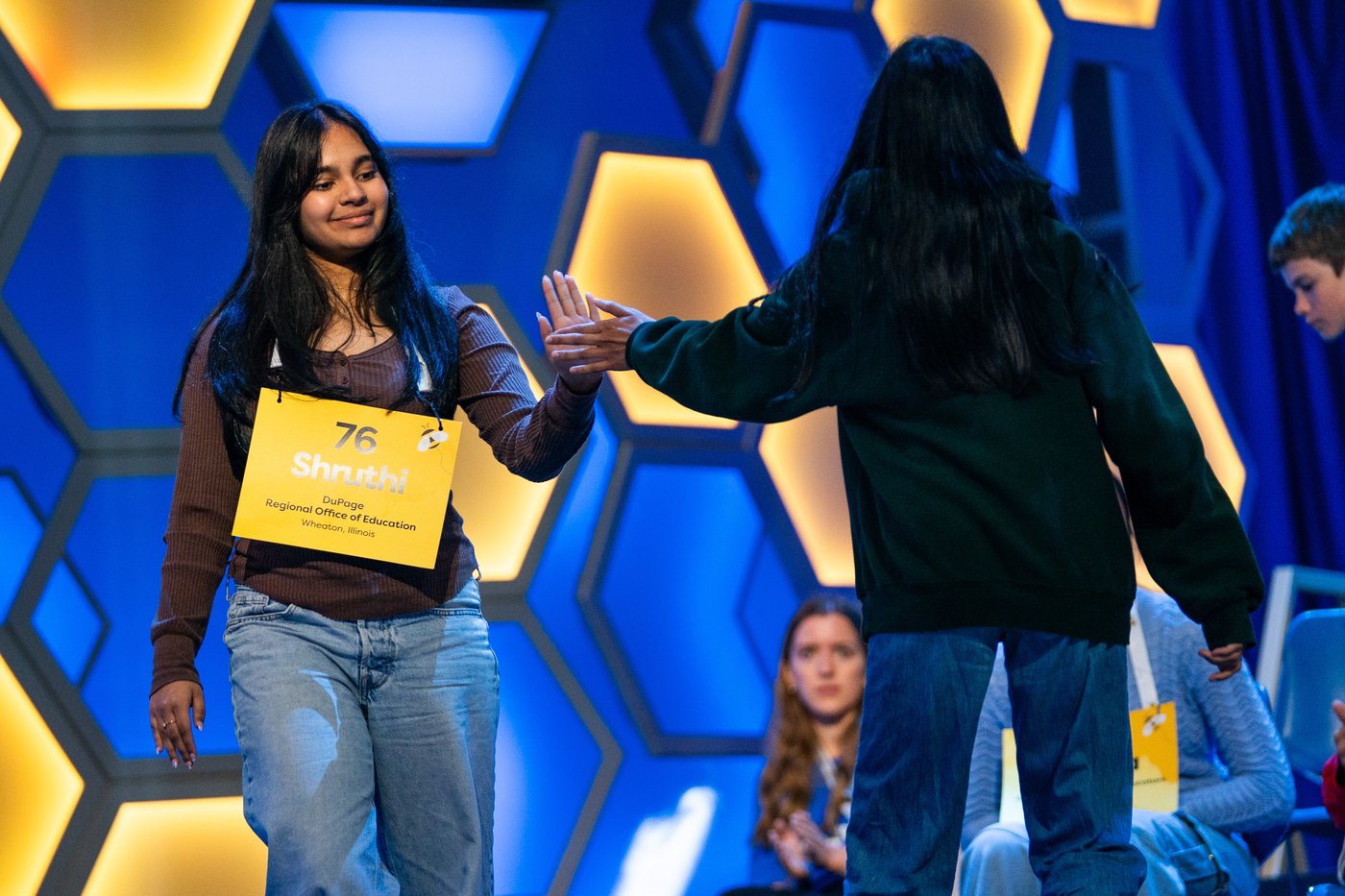 Photos of students competing for the Scripps National Spelling Bee trophy | iNFOnews.ca