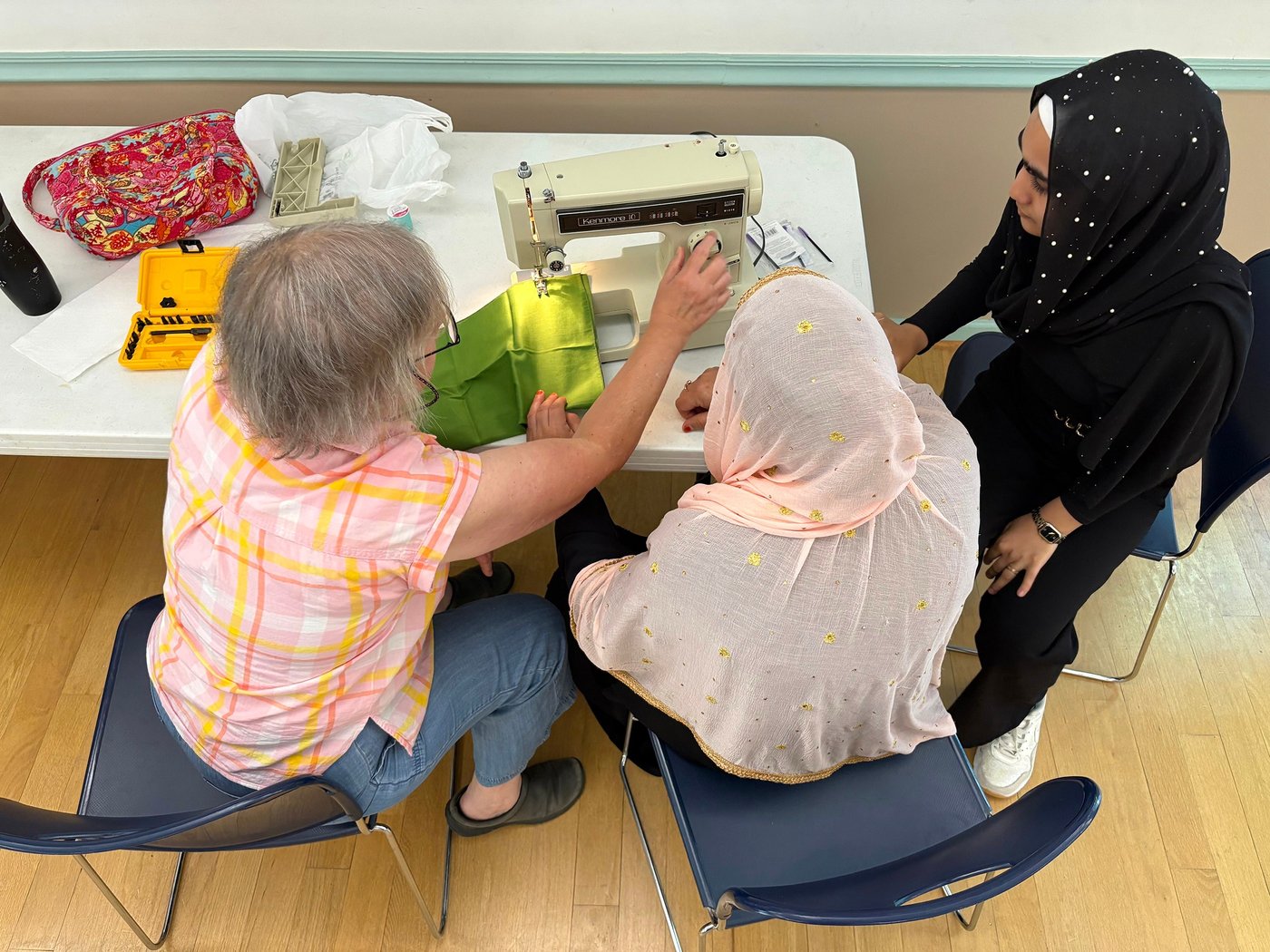 After refugee aid cuts, faith groups help Afghan women connect through sewing | iNFOnews.ca After refugee aid cuts, faith groups help Afghan women connect through sewing | iNFOnews.ca