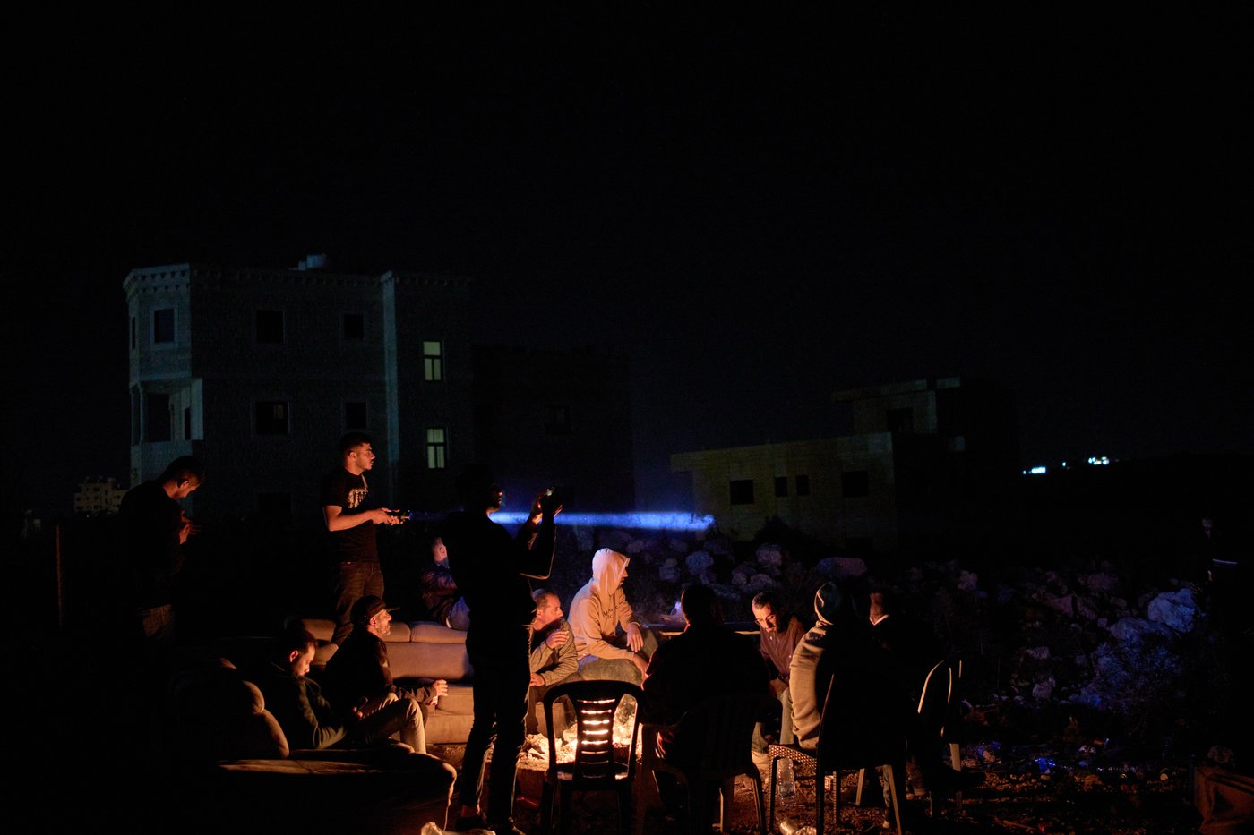 Photos show West Bank Palestinians keeping watch at night as settler violence grows | iNFOnews.ca