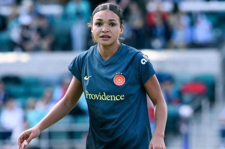Smith plays for the Portland Thorns after missing last season for the birth of her daughter | iNFOnews.ca