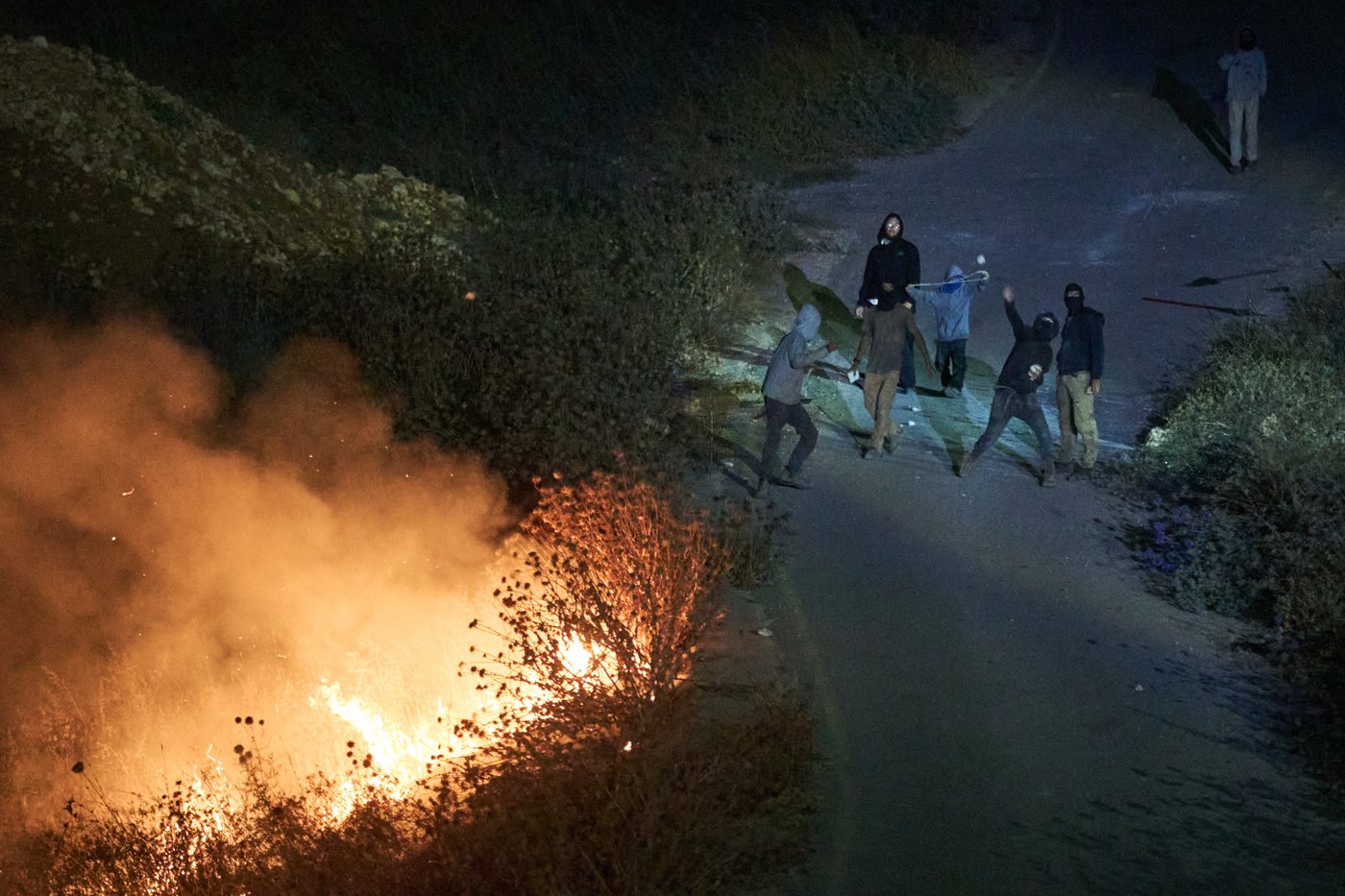 Photos show West Bank Palestinians keeping watch at night as settler violence grows | iNFOnews.ca