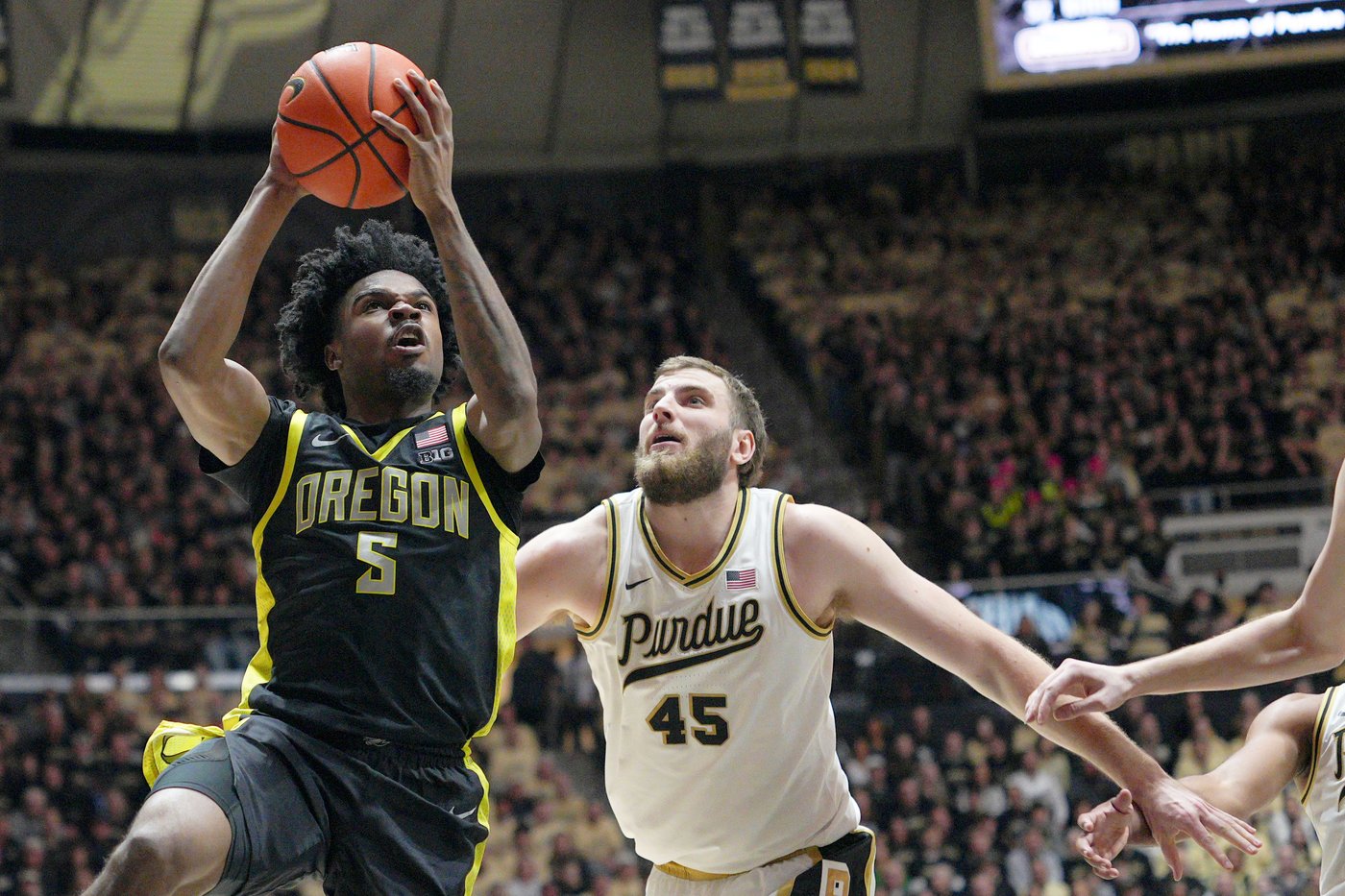 Fletcher Loyer's final minute-scoring flurry helps No. 12 Purdue rally late to get past Oregon 68-64 | iNFOnews.ca