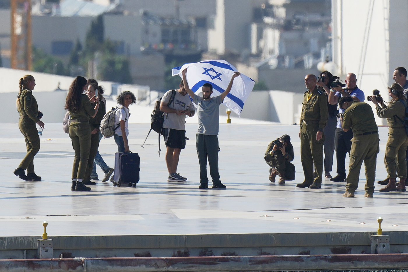 The Latest: Israel identifies remains of 2 more hostages | iNFOnews.ca