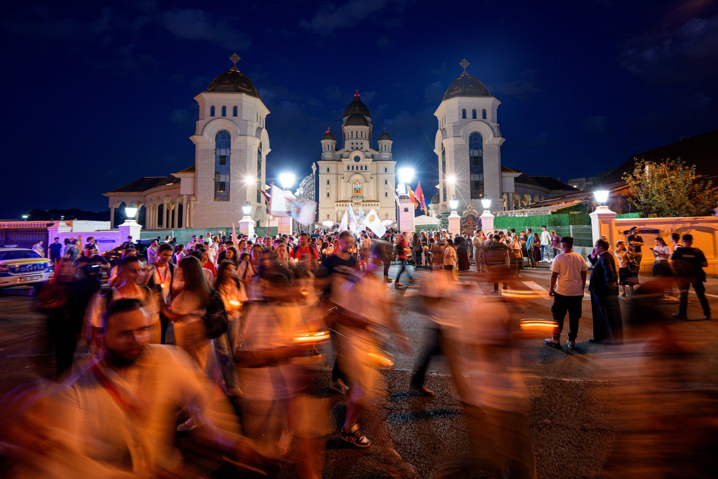 Photos of young Orthodox Christians taking part in a lights procession in Romania’s capital | iNFOnews.ca