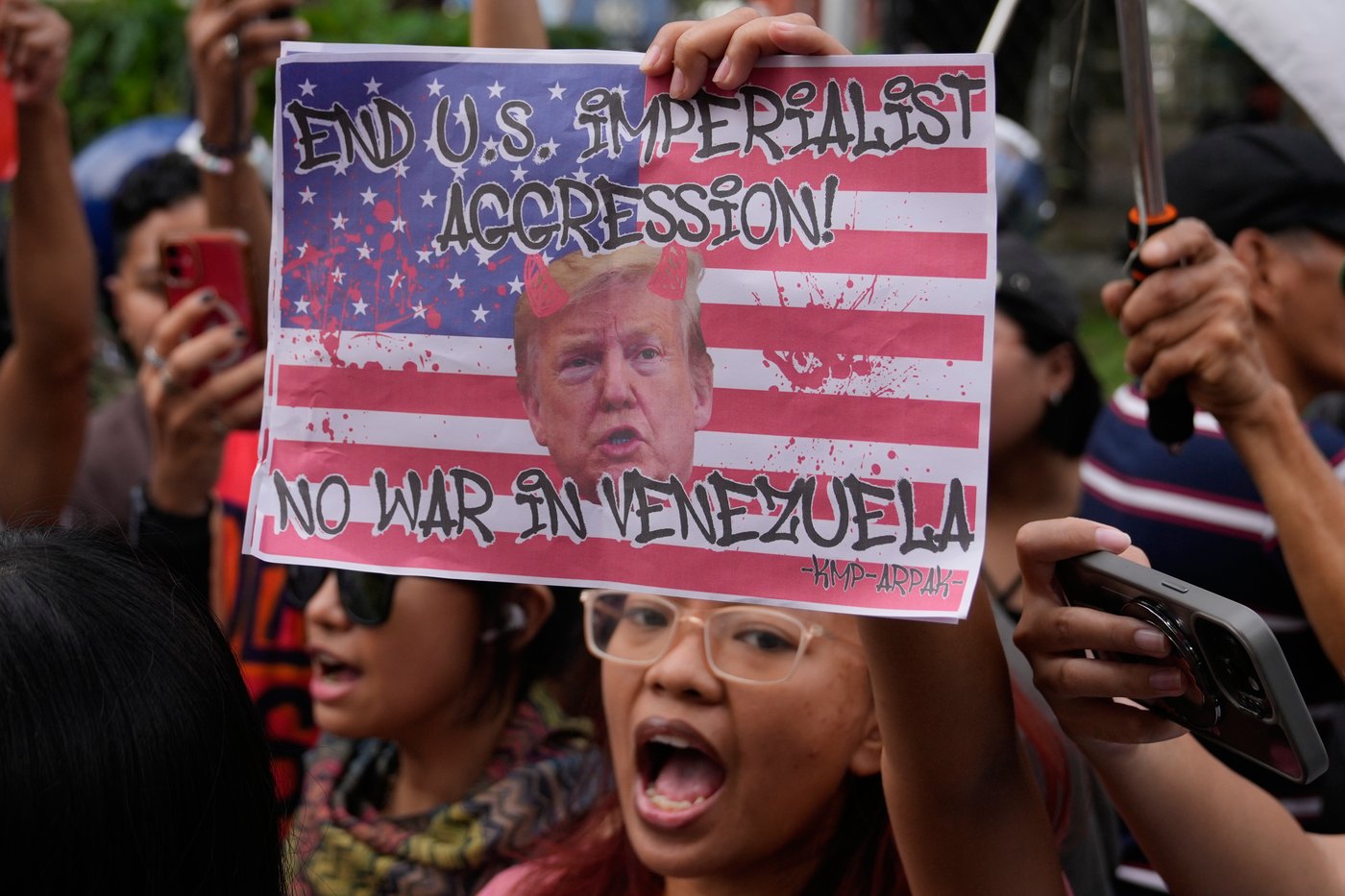 Photos show people reacting to the US capture of Venezuelan President Nicolas Maduro | iNFOnews.ca