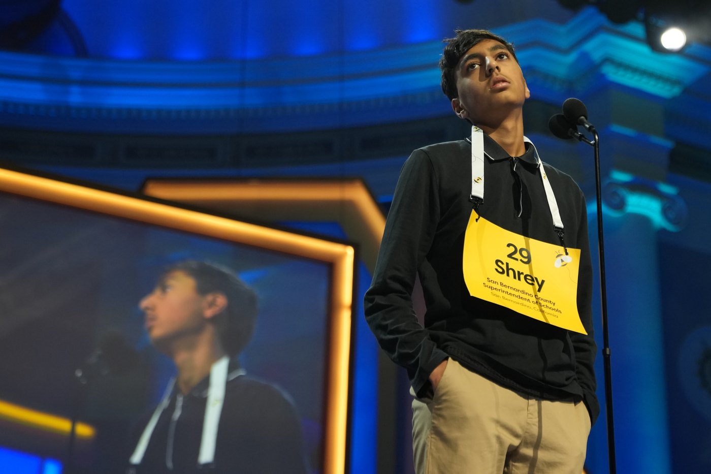 Photos of students competing for the Scripps National Spelling Bee trophy | iNFOnews.ca