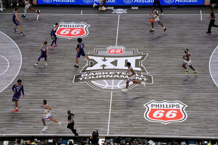Big 12 ditching slippery glass floor for hardwood for rest of tournament | iNFOnews.ca