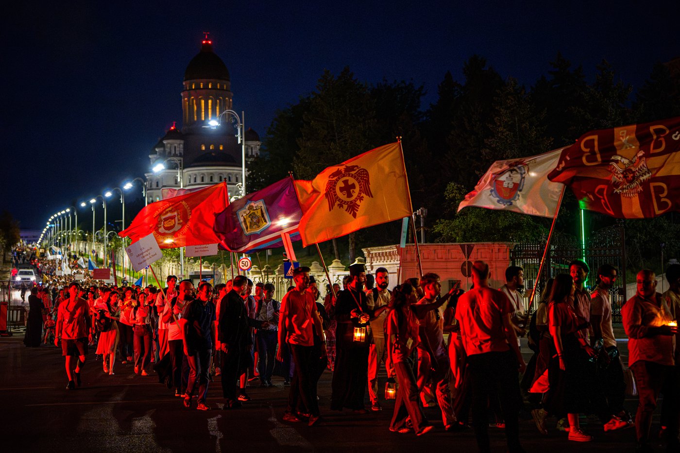 Photos of young Orthodox Christians taking part in a lights procession in Romania’s capital | iNFOnews.ca